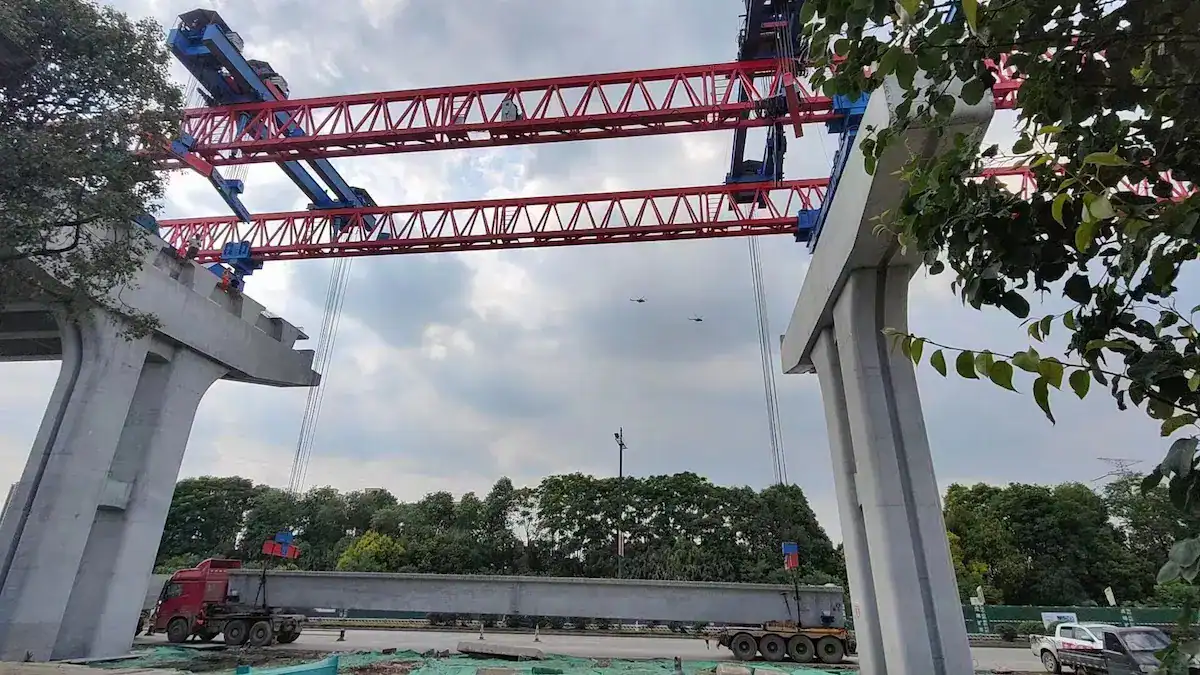 Question 3: What are the load capacity and span range of the bridge launching gantry?